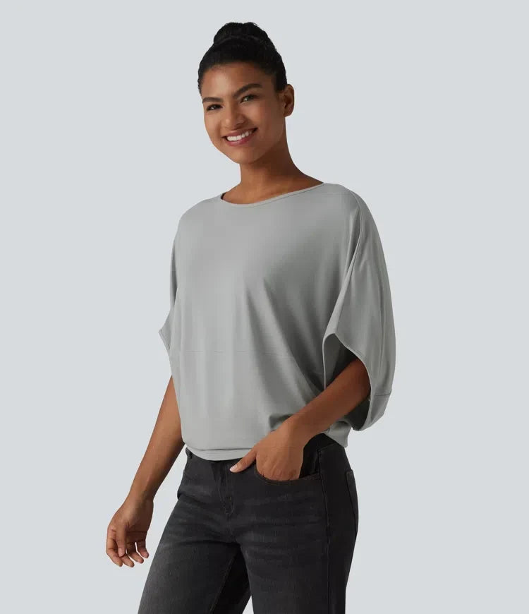 Beige damtopp med rund hals och korta fladdermusärmar för vardag
