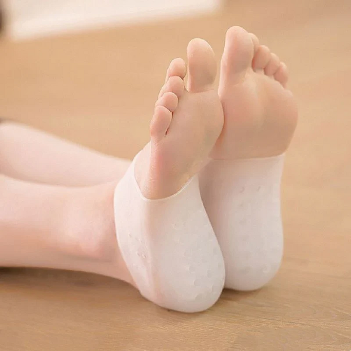 Undersidan av fötterna med osynliga skoinlägg