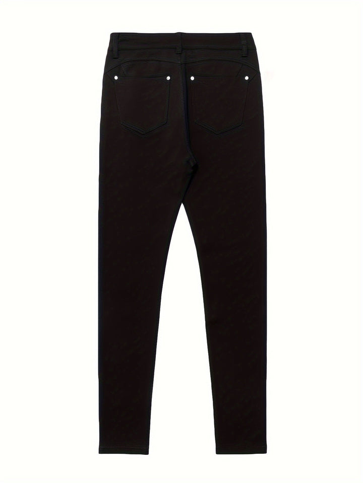 Högmidjade stretchjeans för dam med slim fit sett bakifrån