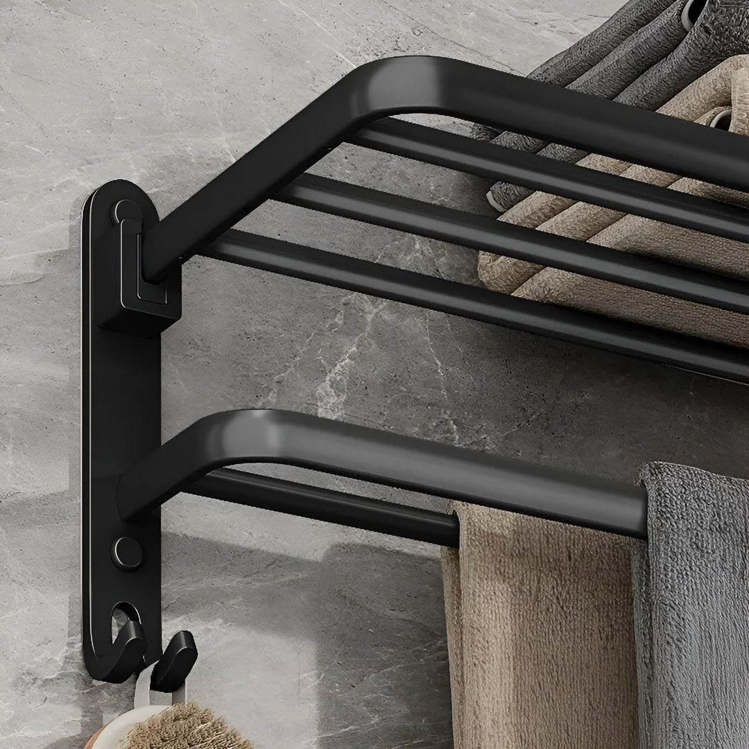 Smidig kökstillbehör och handdukshängare monterad på vägg