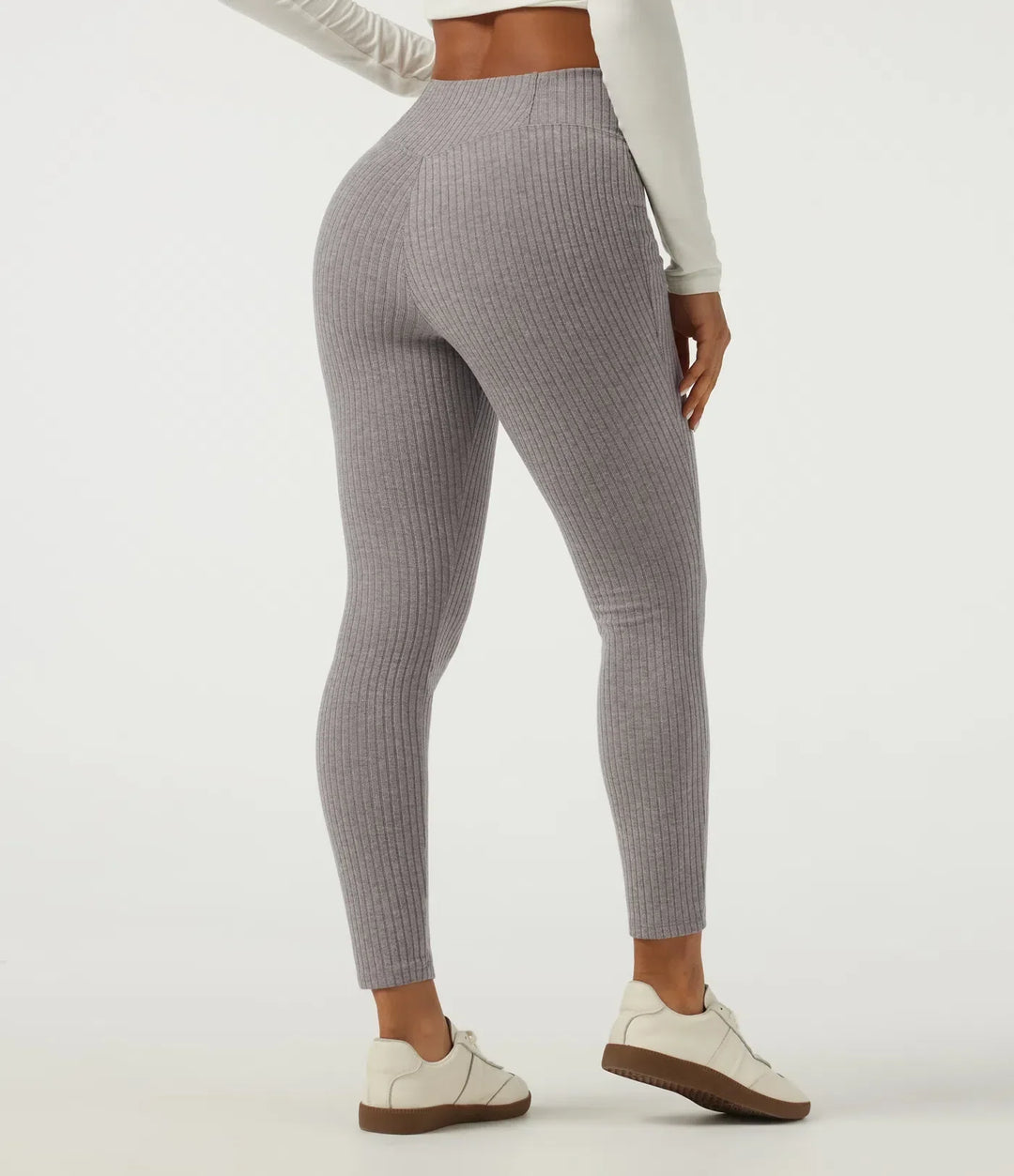 Högmidjade damleggings med dekorativ crossover och smarta fickor