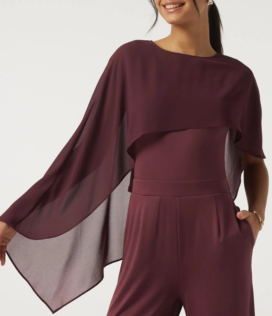 Snygg festjumpsuit för kvinnor med praktiska fickor och vida ben