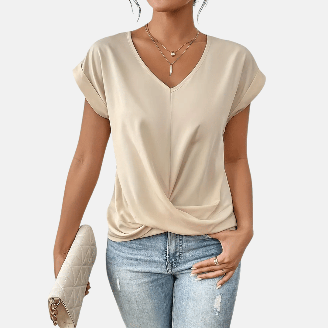 Beige damblus med kort ärm och V-ringning