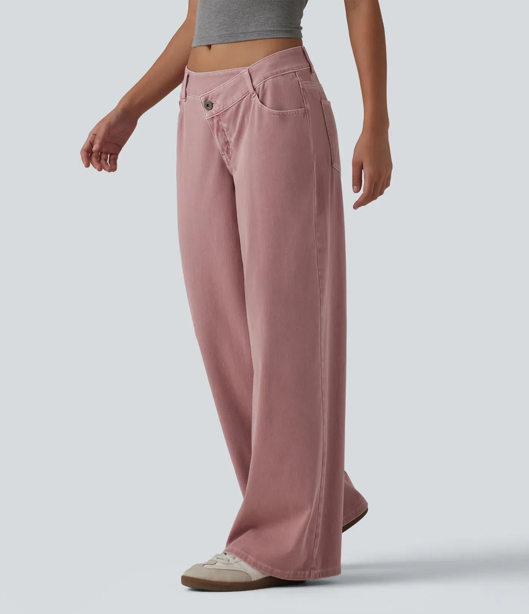 Trendiga modejeans med vida ben, låg midja och asymmetrisk stängning