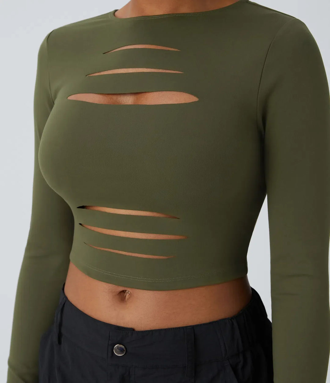 Snygg damtopp med ärmlös design och stilrena utskurna detaljer för mode