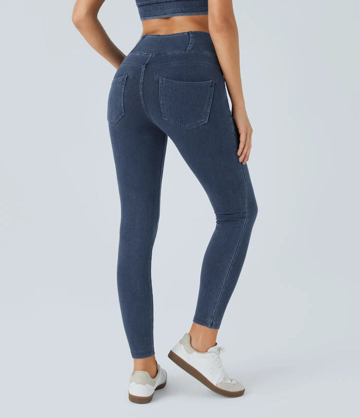 Högmidjade crossover leggings i stretchigt denim material