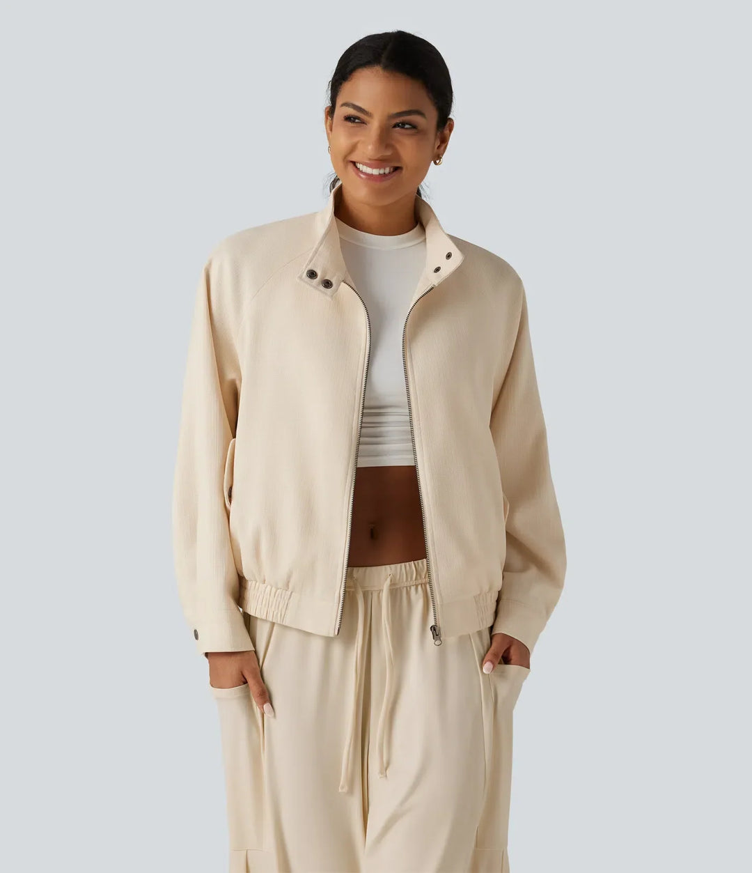 Elegant damjacka med halvpolo och lång ärm i modetrendig design