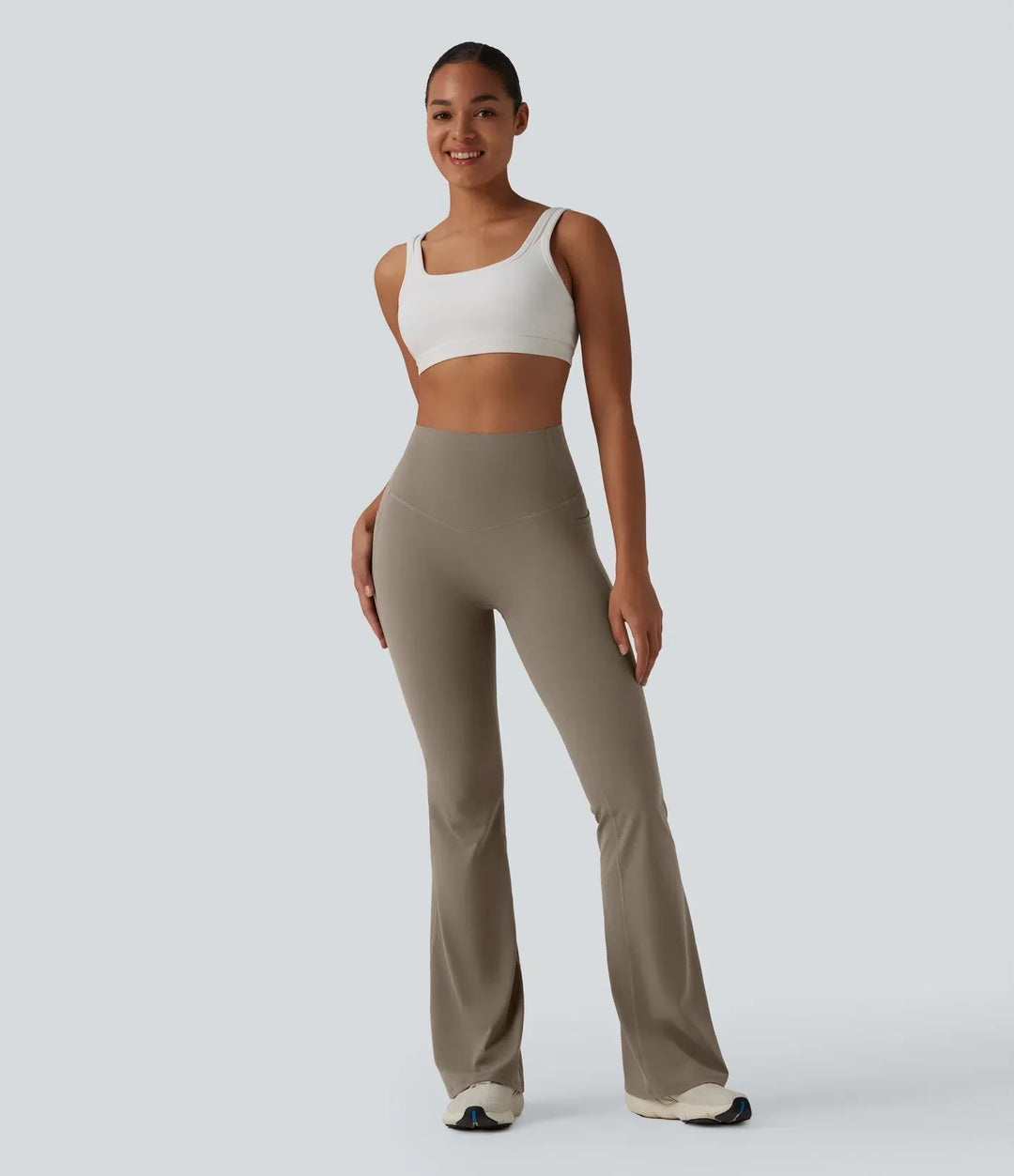 Kompletta yogaleggings med utsvängda ben, hög midja och fickor