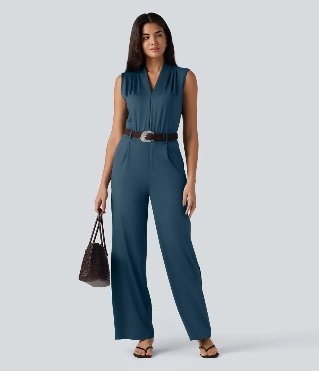 Trendig jumpsuit damkläder med V-ringad hals och ärmlös skärning för varma dagar