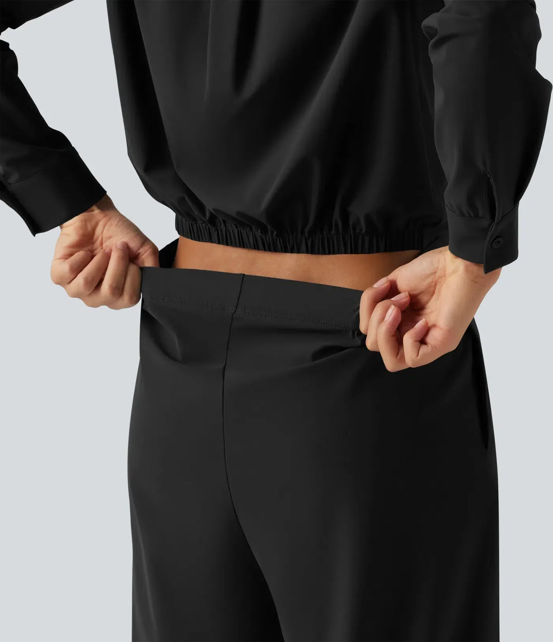 Stilren damjumpsuit med raka ben och matchande skärp i midjan
