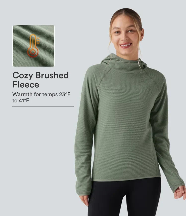 Damkläder långärmad grön sweatshirt med huva framifrån
