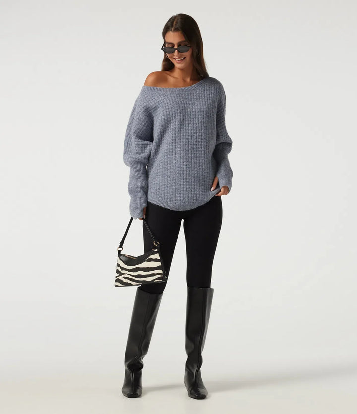 Smidig damtröja med långa ärmar och praktiska tumhål