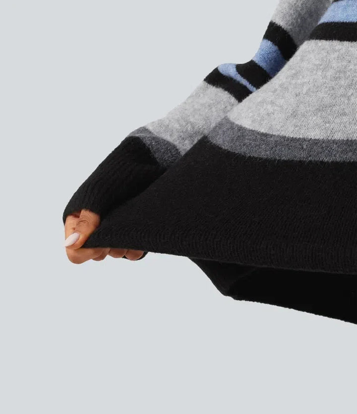 Modell som bär bekväm och stilren långärmad tröja med ränder