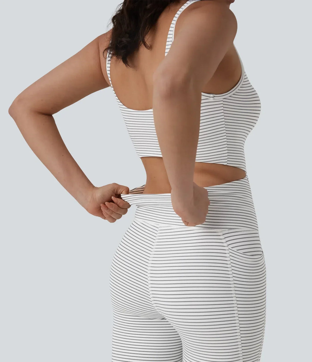 Snygg sportig jumpsuit med ränder, perfekt för träning och yoga