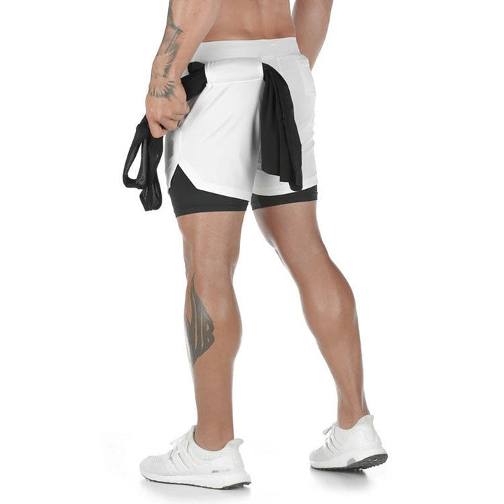 Mörka träningsshorts med innerbyxa och funktionell design för herr
