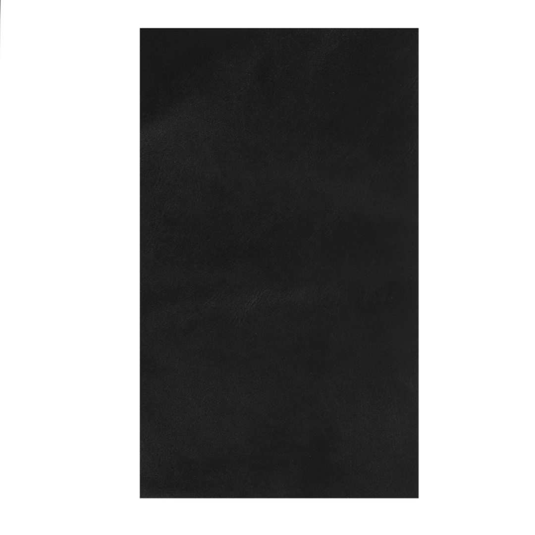 Närbild på textur hos självhäftande läderlagning i mörk nyans
