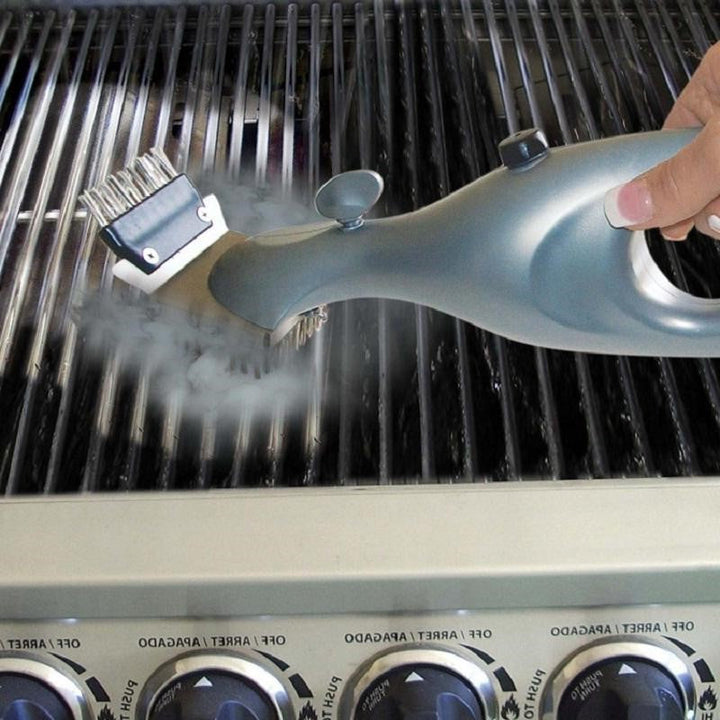 Grillborste som rengör grillgaller med het ånga