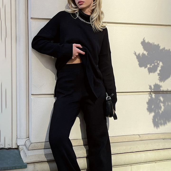 Svart långärmad turtleneck tröja med matchande byxor
