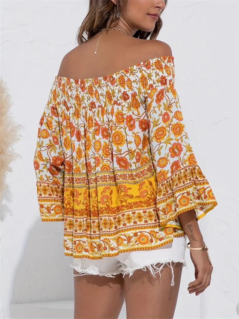 Blommig off shoulder blus för dam i mjukt material med resår