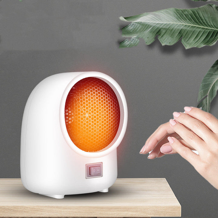 Smidigt ellement och varm fläktvärmare i modern design för inomhusbruk.