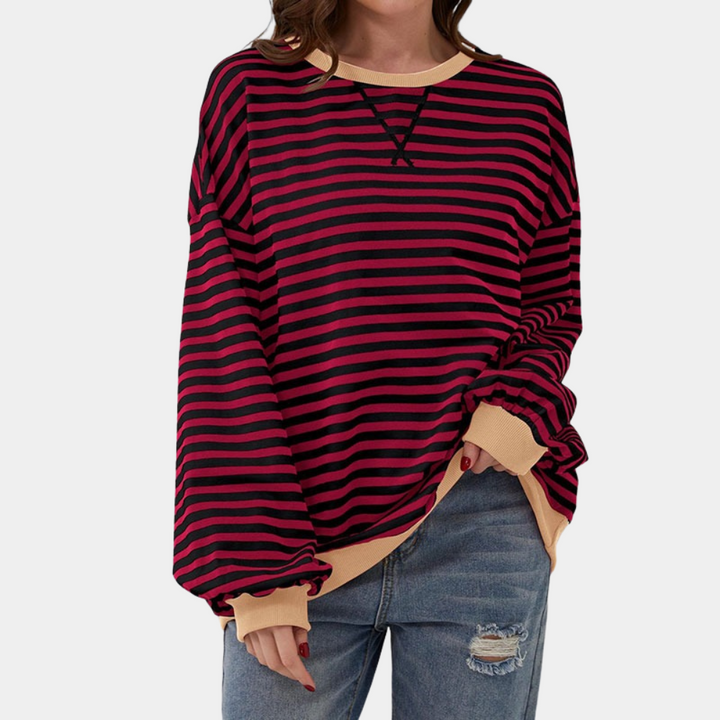 Snygg baksida av dam oversized randig tröja i modernt vardagsmode