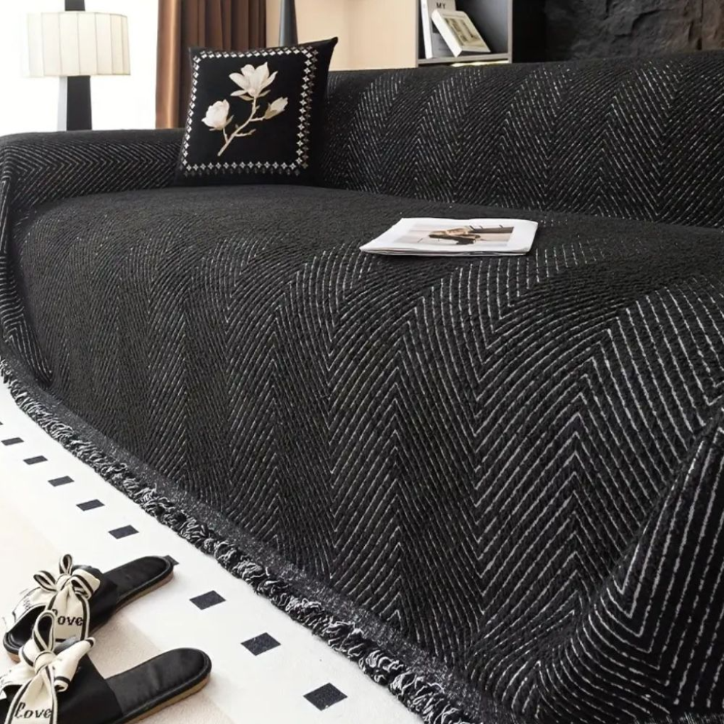 Vändbart sofföverdrag med elegant herringbone-mönster i vardagsrummet
