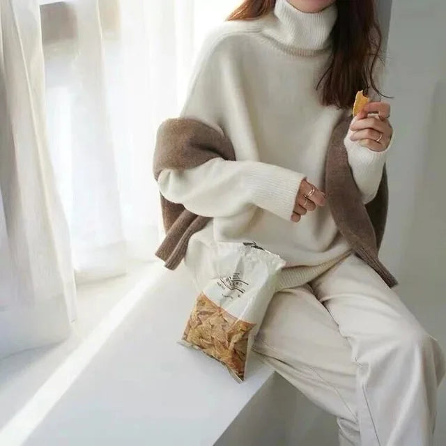 Stickad damtröja med turtleneck i mysig och varm design för kalla dagar