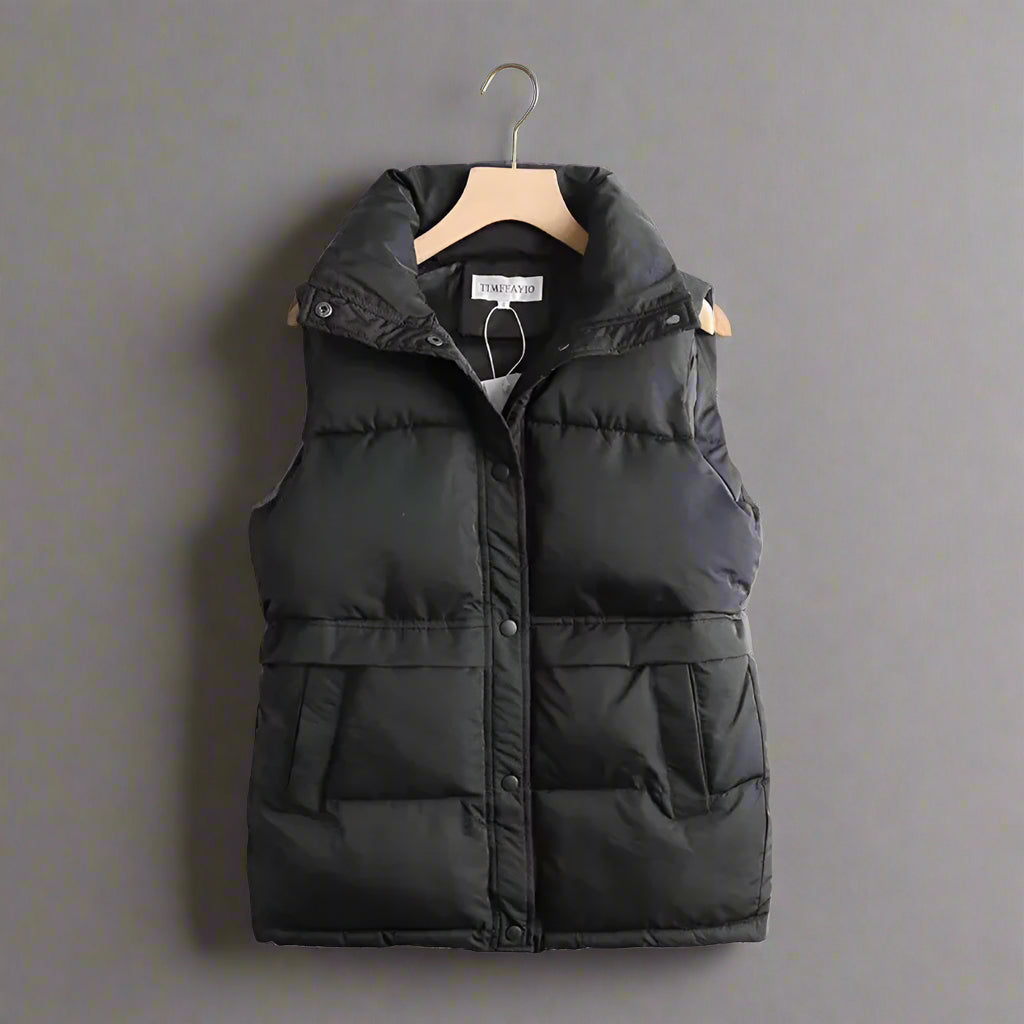 Svart vindtät bodywarmer för kvinnor på galge