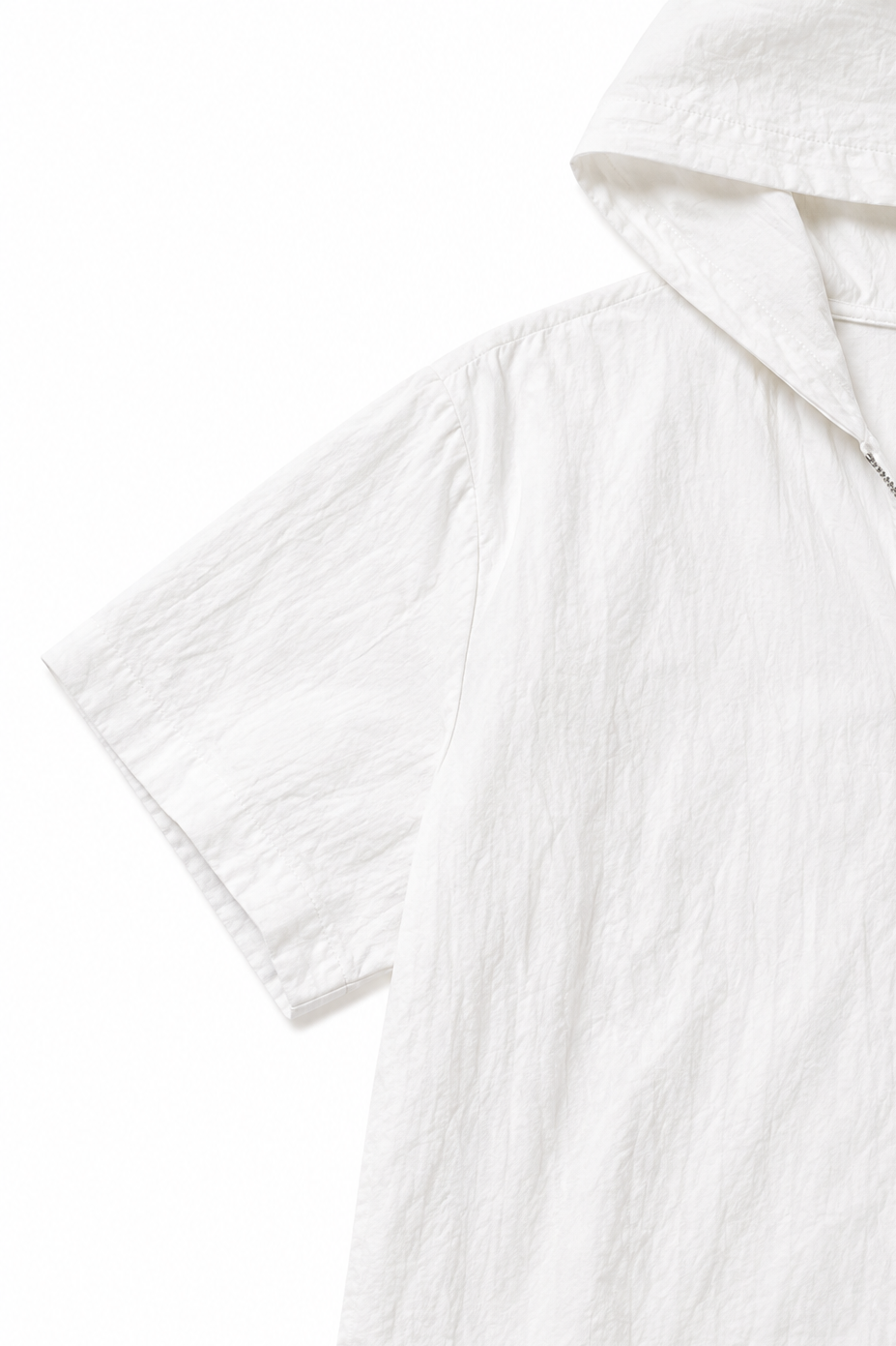 Närbild på tyget i det rosa loungewear setet med hoodie