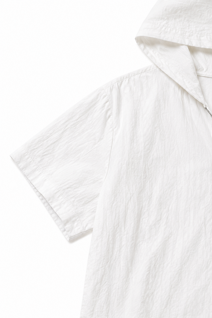 Närbild på tyget i det rosa loungewear setet med hoodie