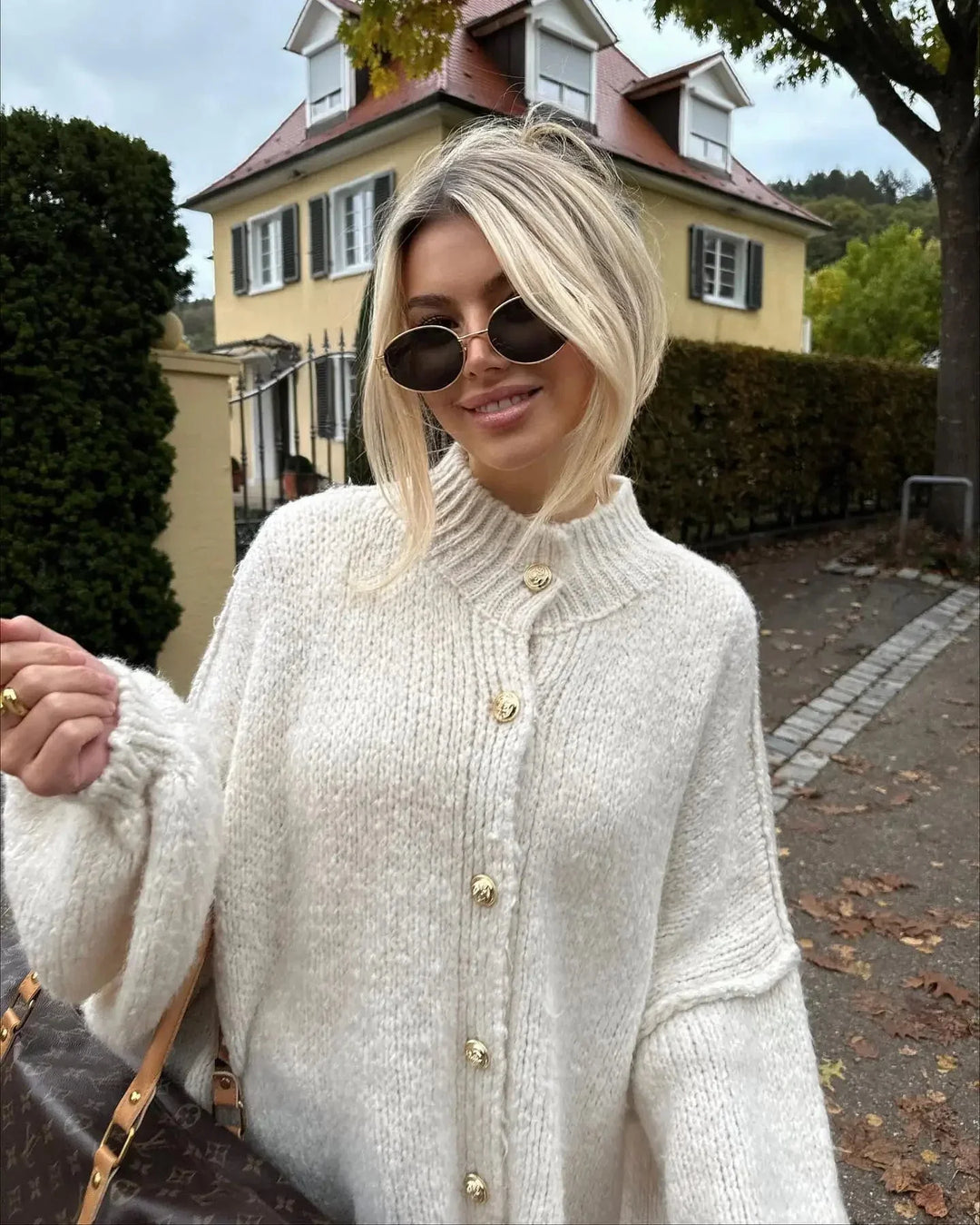 Chunky cardigan för dam i stickad modell med krage