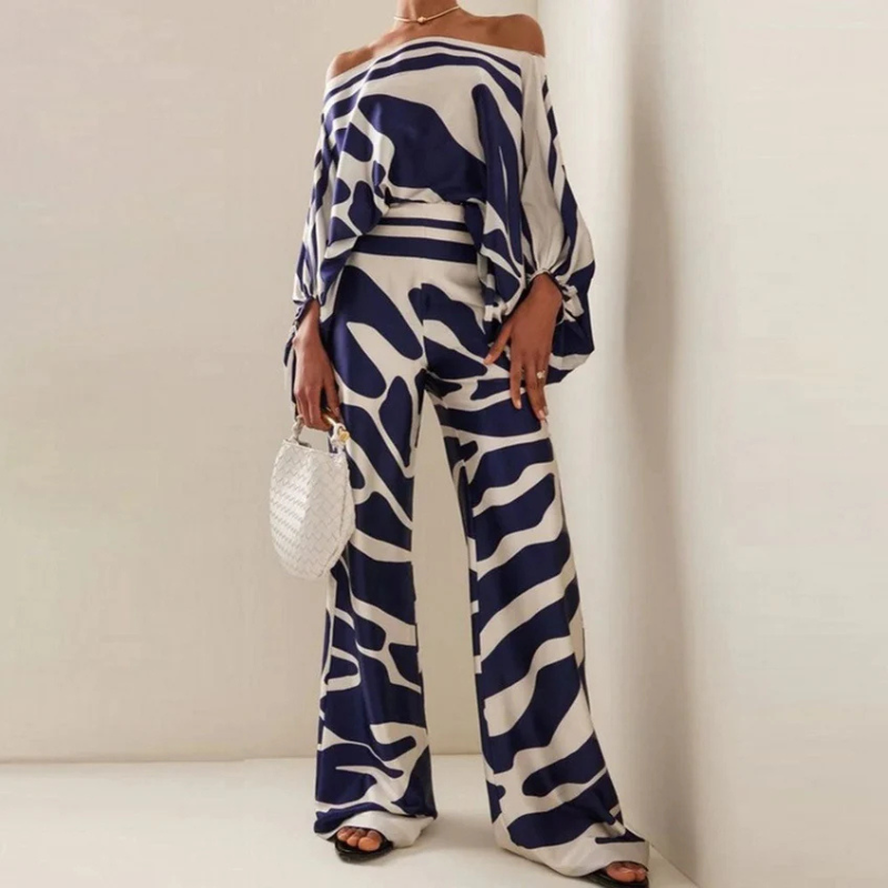 Snyggt co-ord set för kvinnor vis bakifrån, off-shoulder tröja och vida byxor