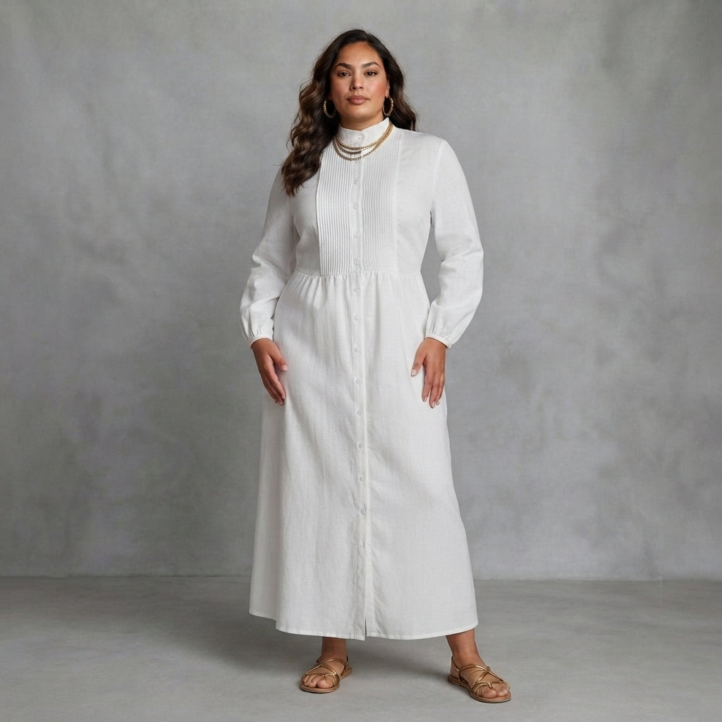 Modell bärande den eleganta Colette maxiklänningen med långa ärmar