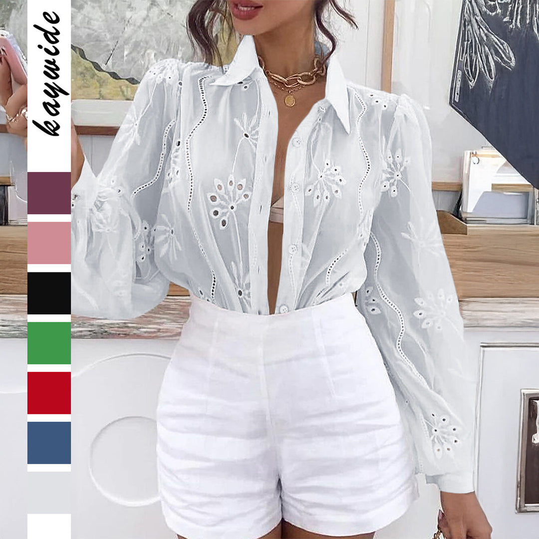 Vit transparent damblus med blommiga broderier och volanger