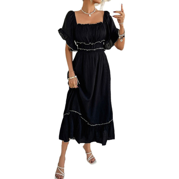 Elegant lång sommarklänning för dam i off-shoulder modell med vackra volanger