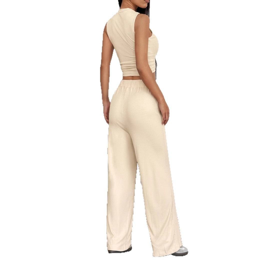 Beige damset med crop top och vida byxor för sommarmode