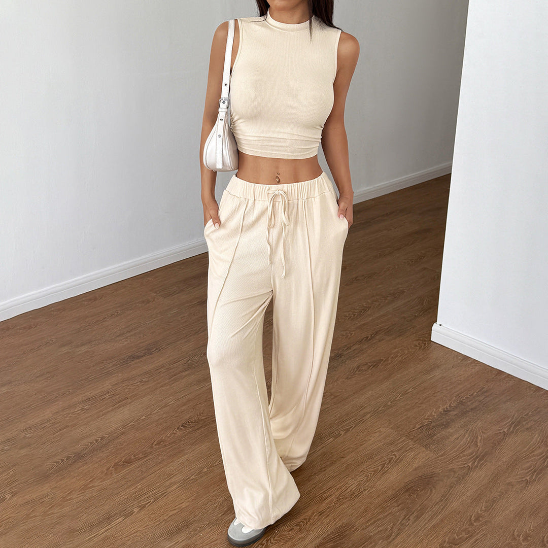 Tvådelat damkläder set med crop top och lösa byxor i vardagsstil