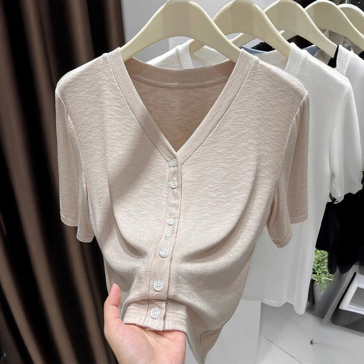 Damkortärmad omlottblus med knappar i khaki