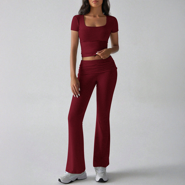 Dam sportigt set i vinkörning med kortärmad topp och högmidjade leggings