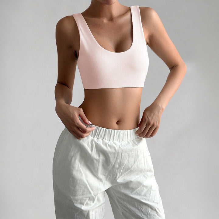 Rosa sporttopp för dam i minimalistisk design