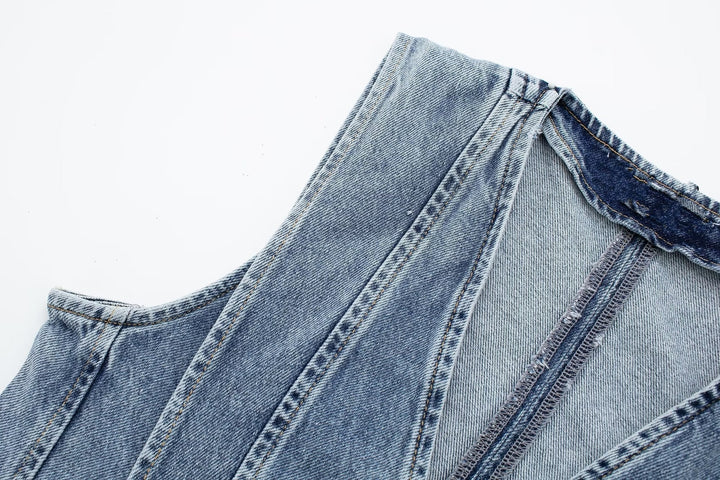 Ärmlös damväst i denim med knäppning, stilenhet för vardag
