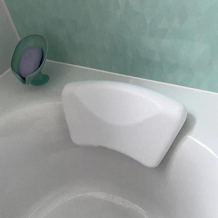 Ergonomisk badkudde i vitt utförande med sugproppar för stabil montering i badkar