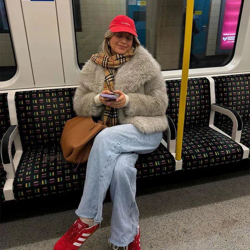 Snygg och mysig vinterjacka för dam i elegant beige ton