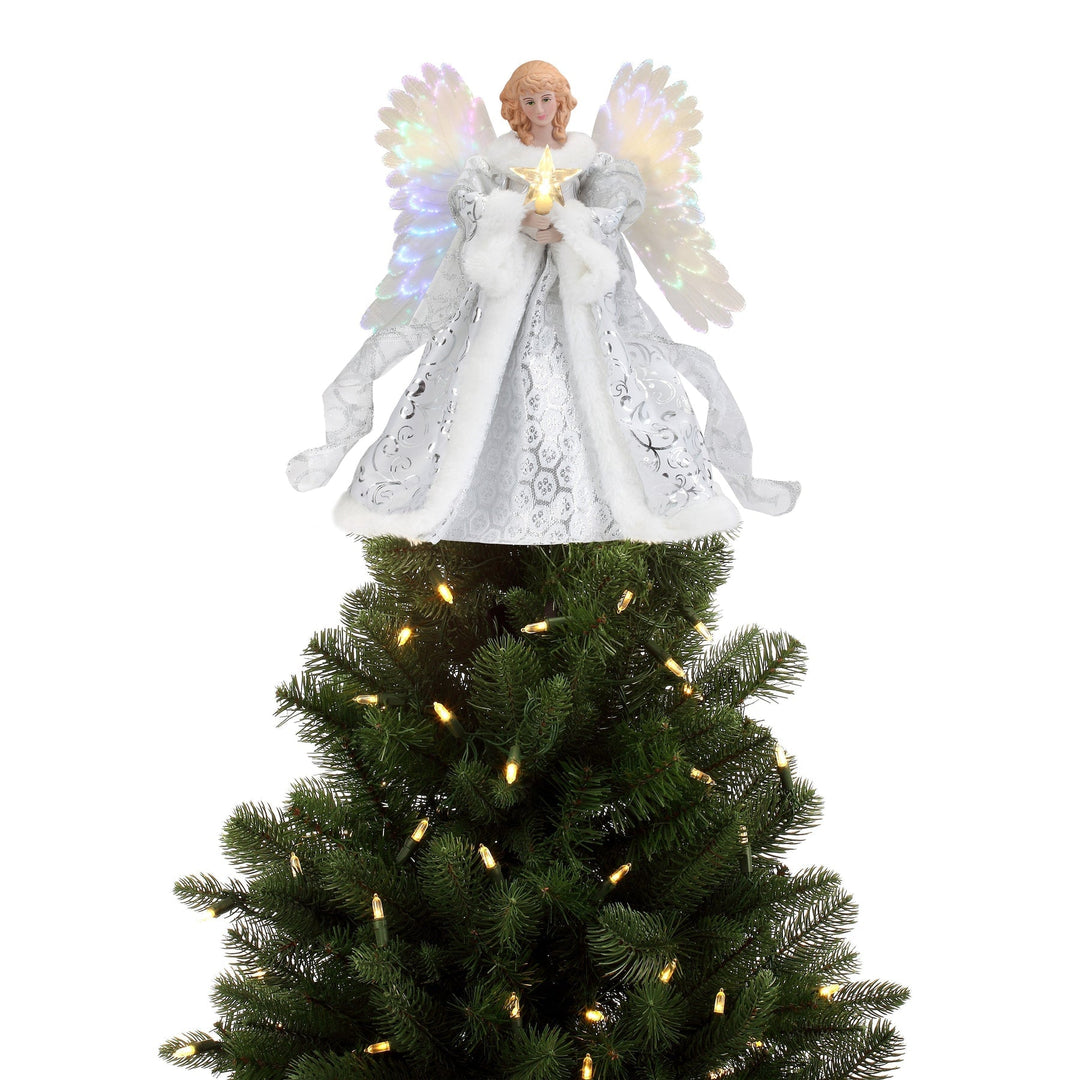 Detaljbild på vit och silverskimrande julgransängel