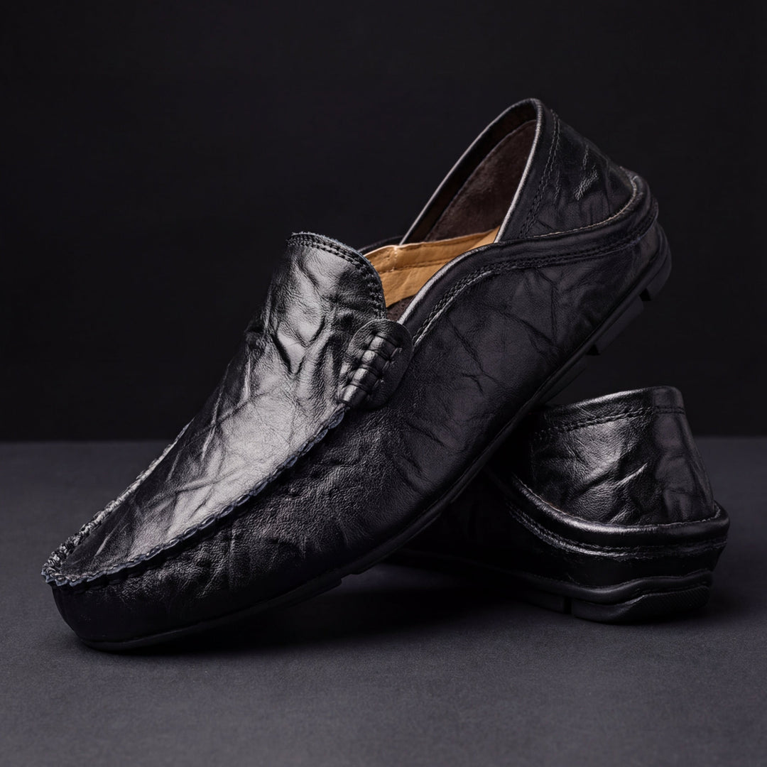 Svart herrsko i klassisk loafers-modell med stilren design
