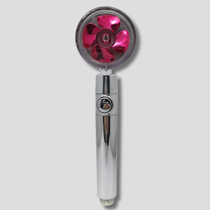 Rosa duschmunstycke med kromdetaljer och vattenstopp