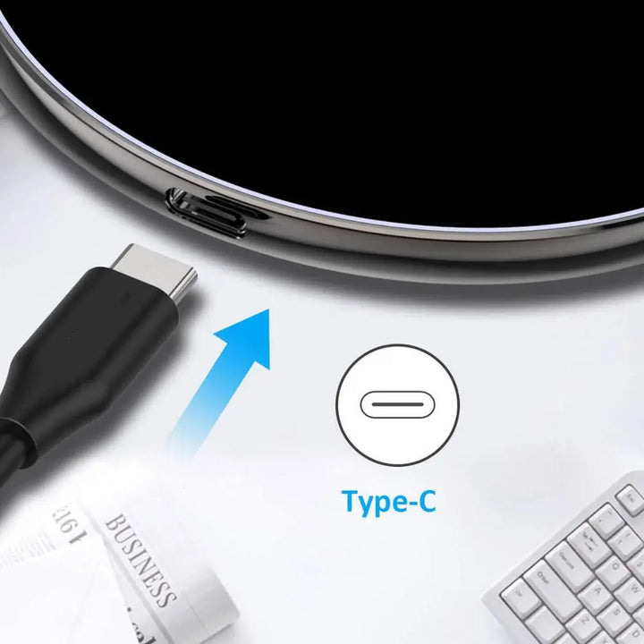 Vit trådlös laddare kompatibel med både iPhone och Android enheter