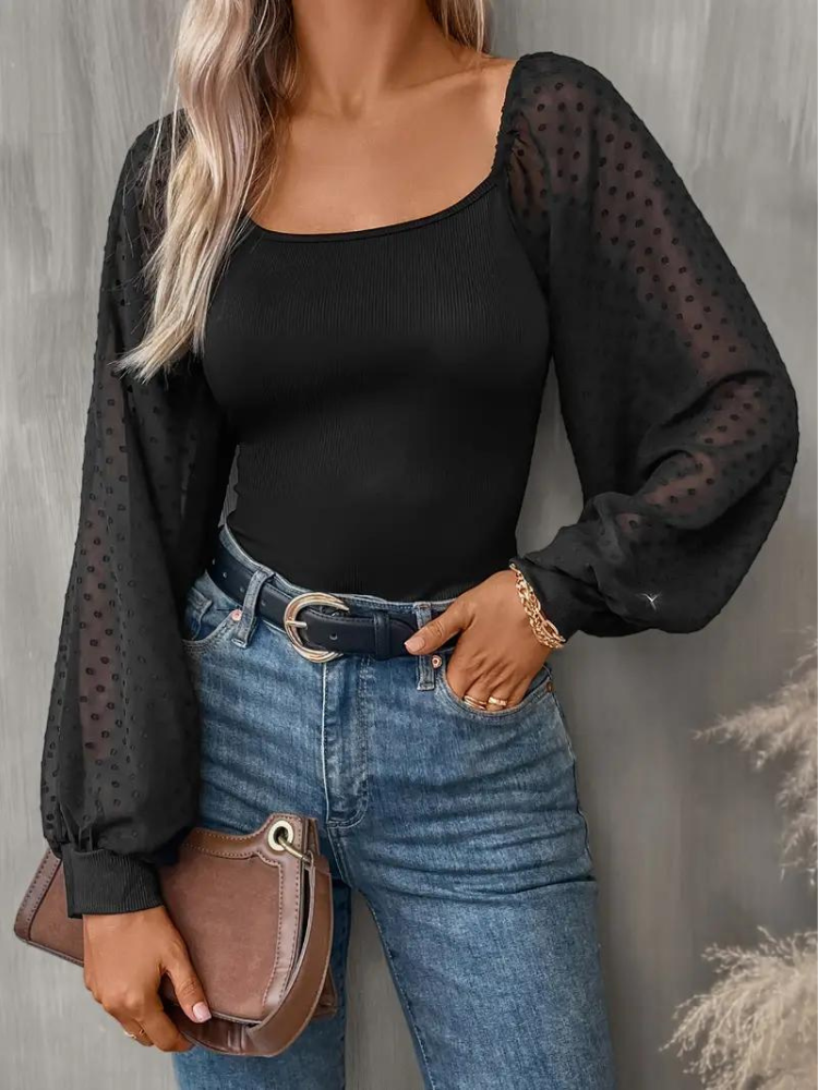 Elegant damtopp med skira ärmar i fin modell