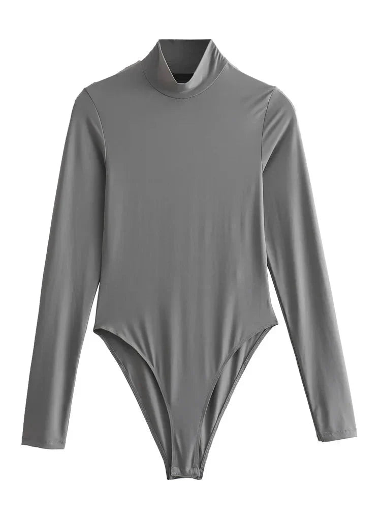 Baksida av elegant svart turtleneck bodysuit med långa ärmar