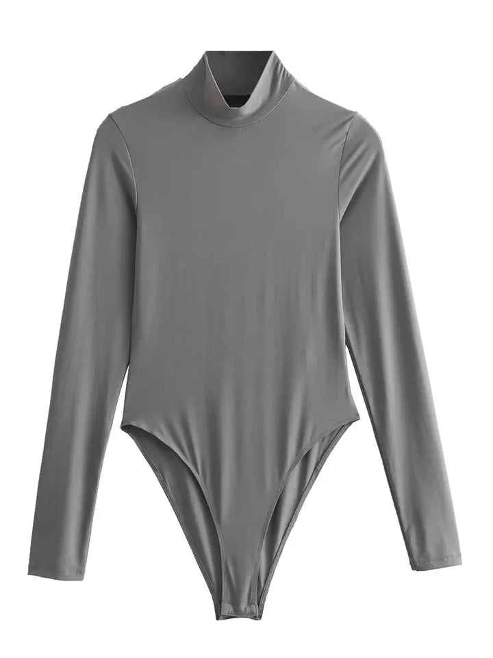 Baksida av elegant svart turtleneck bodysuit med långa ärmar